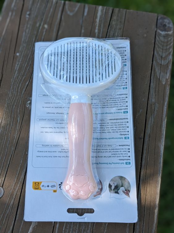 Samočistící kartáč na zvířecí chlupy růžový s packou